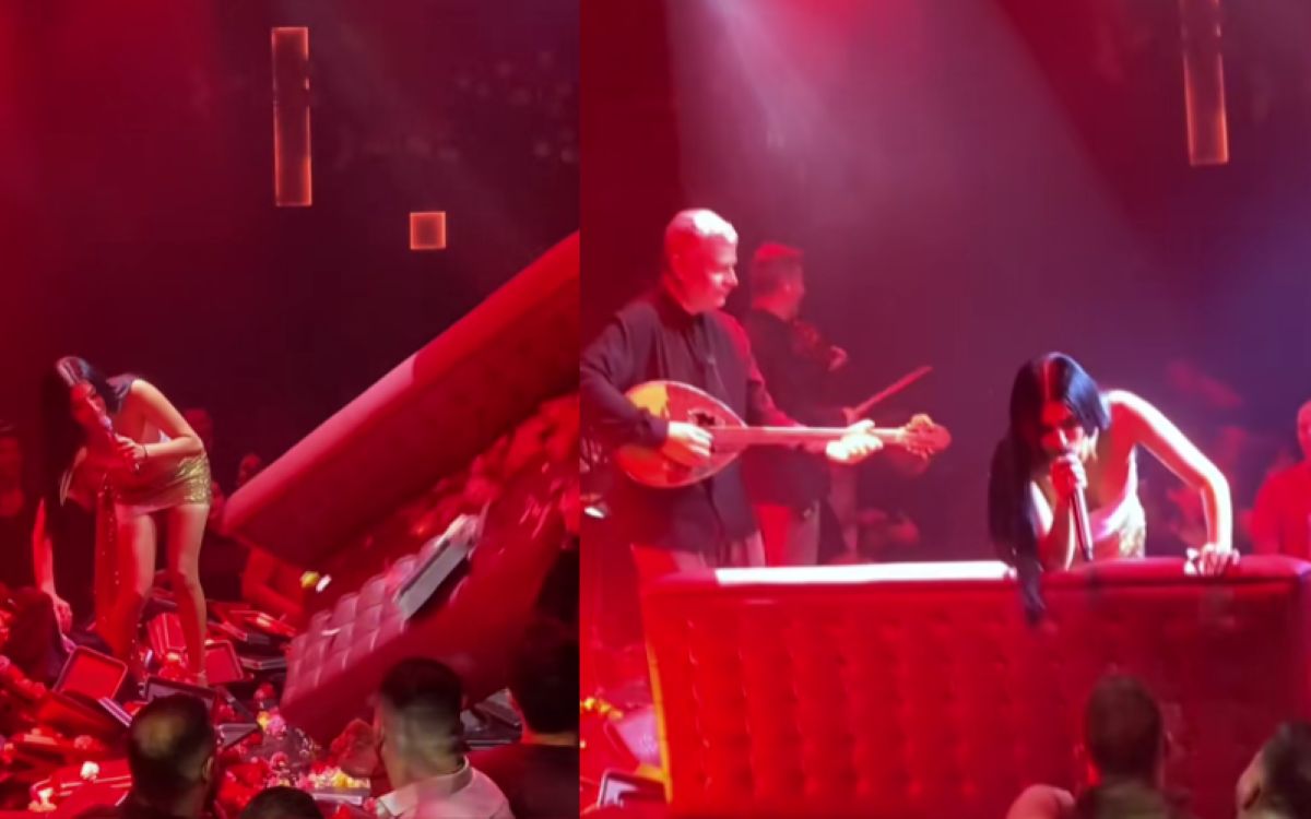 τραγουδίστρια Αναστασία στην πίστα κατά τη διάρκεια του περιστατικού με τον καναπέ